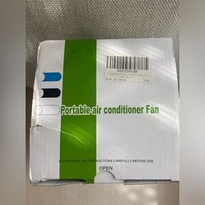 Never used, unopened portable air conditioner